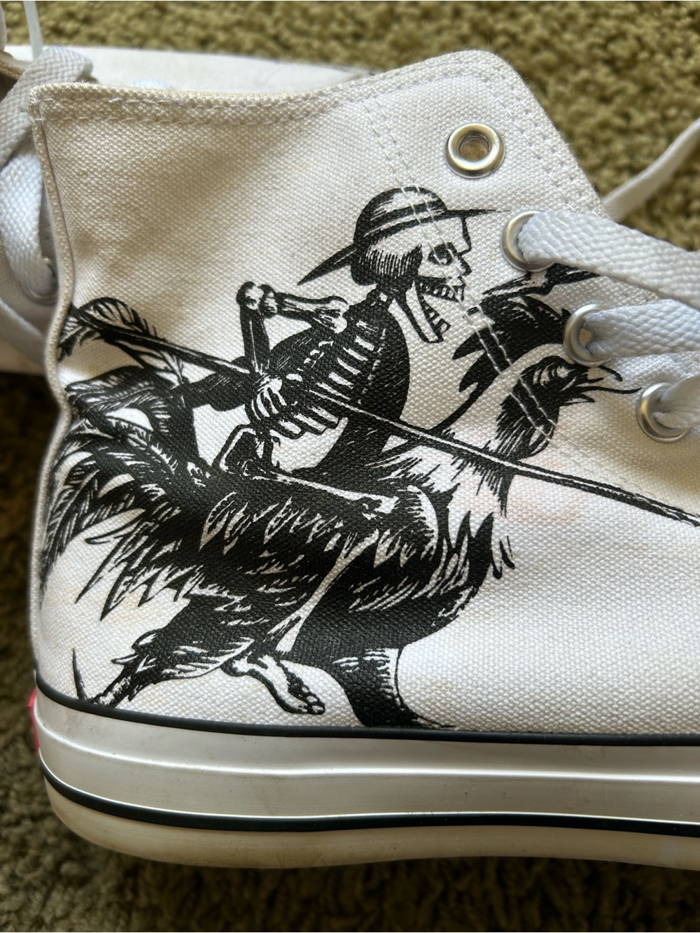 White Canvas High-Top Sneaker with Black Skeleton & Bird Graphic